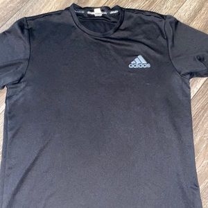 Black adidas shirt. Athletic.